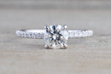 Under Hidden Halo Round Diamond Engagement Ring