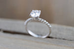 FOREVER ONE Charles and Colvard Moissanite Round Shared Prong Single Bead Engagement Ring